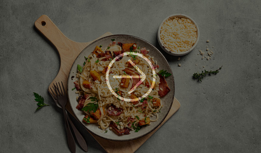 Plate served with pasta, parmesan and pumpkin - La Passione